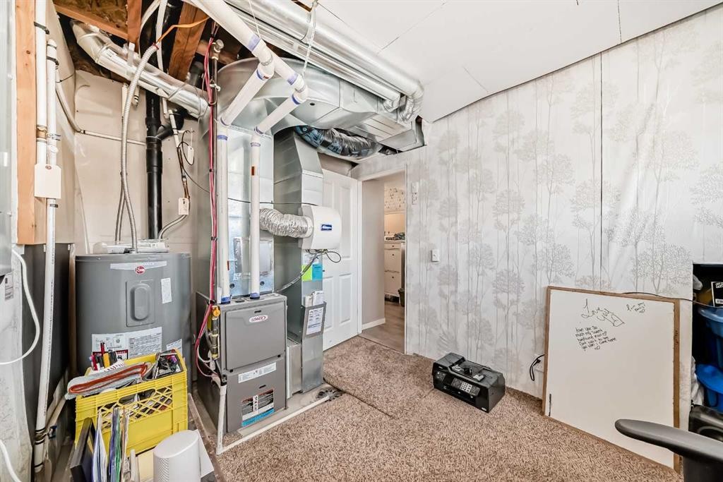 656 Copperpond Boulevard Se, Calgary, AB - Indoor Photo Showing Basement