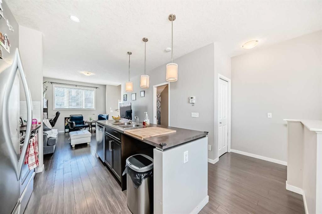 656 Copperpond Boulevard Se, Calgary, AB - Indoor Photo Showing Kitchen With Double Sink With Upgraded Kitchen