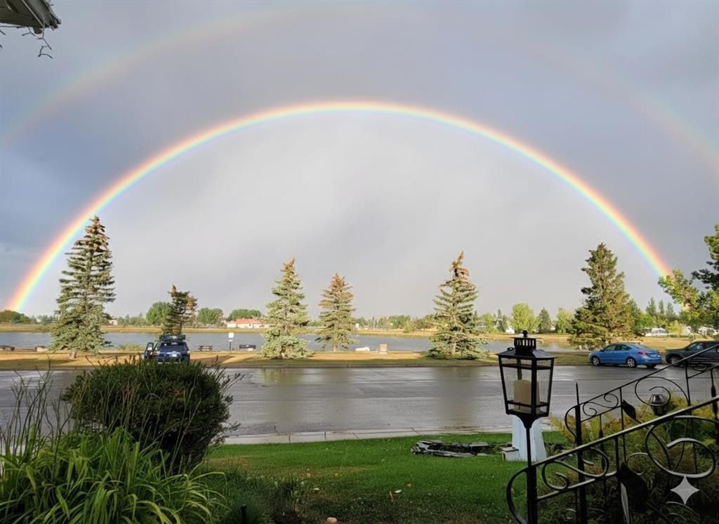 607 9 Street Se, High River, AB - Outdoor With Body Of Water With View