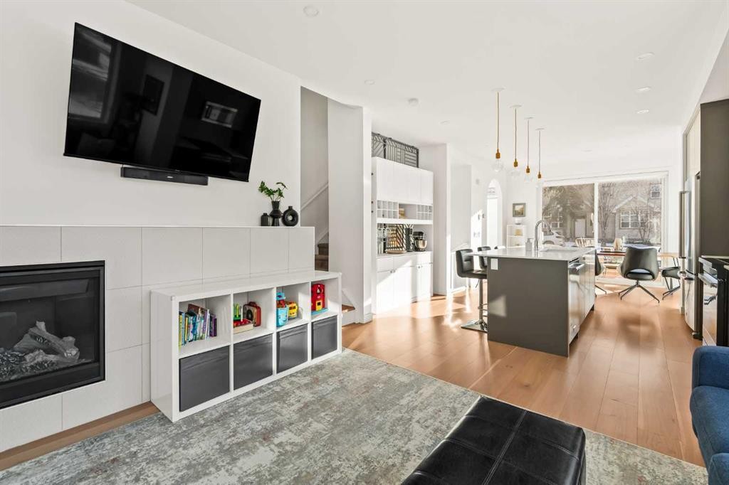 1940 Bowness Road Nw, Calgary, AB - Indoor Photo Showing Living Room With Fireplace