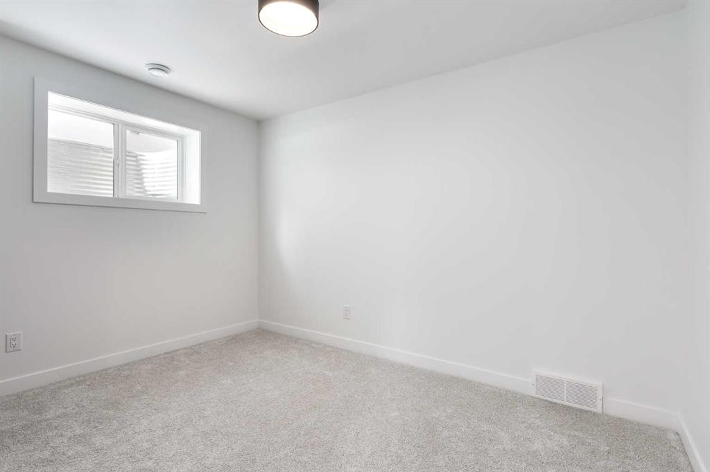 58 Edgevalley Close Nw, Calgary, AB - Indoor Photo Showing Other Room