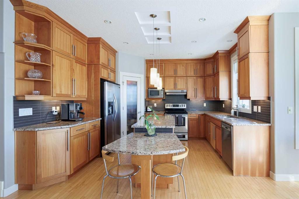 98 Tuscany Estates Crescent Nw, Calgary, AB - Indoor Photo Showing Kitchen With Stainless Steel Kitchen With Double Sink
