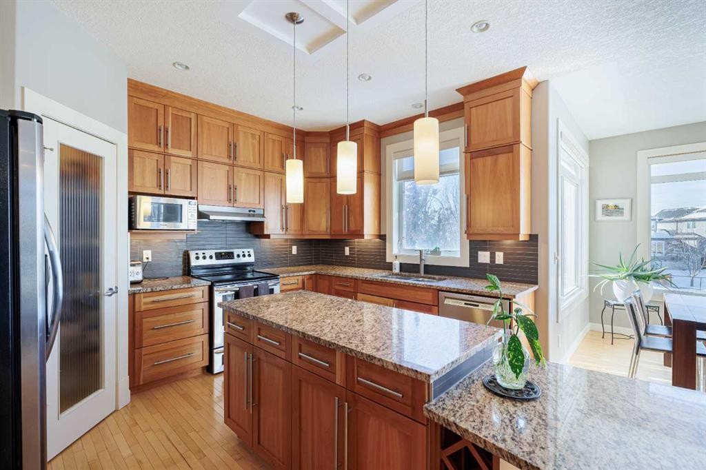 98 Tuscany Estates Crescent Nw, Calgary, AB - Indoor Photo Showing Kitchen With Stainless Steel Kitchen With Upgraded Kitchen
