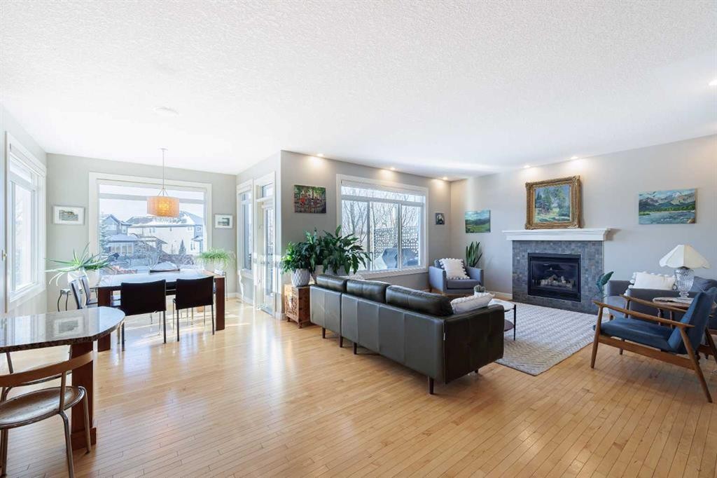 98 Tuscany Estates Crescent Nw, Calgary, AB - Indoor Photo Showing Living Room With Fireplace