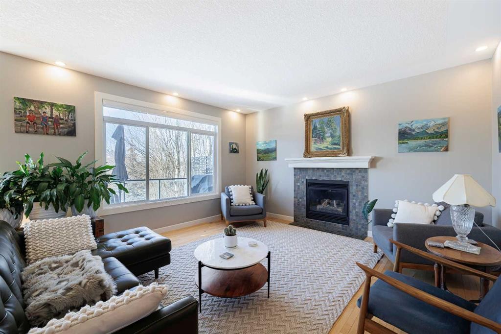 98 Tuscany Estates Crescent Nw, Calgary, AB - Indoor Photo Showing Living Room With Fireplace