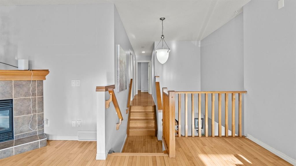 158 Covemeadow Road Ne, Calgary, AB - Indoor Photo Showing Other Room With Fireplace
