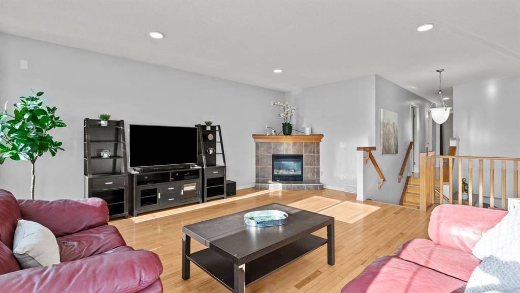 158 Covemeadow Road Ne, Calgary, AB - Indoor Photo Showing Living Room With Fireplace
