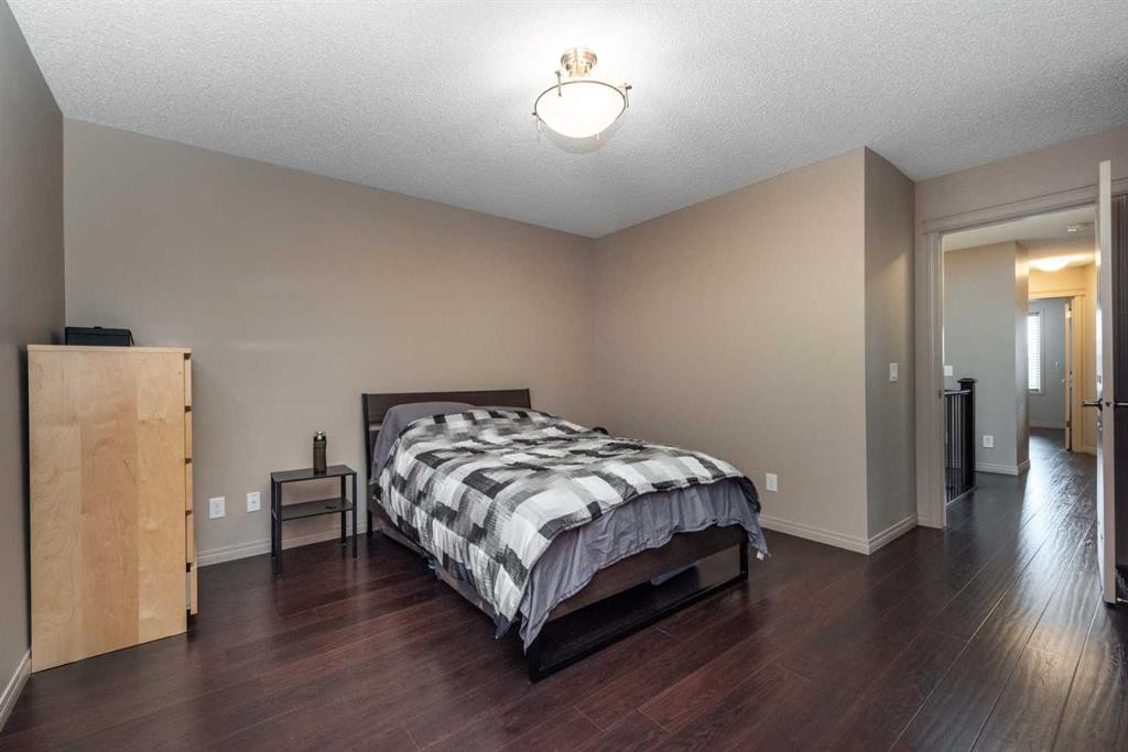 54 Cranford Bay Se, Calgary, AB - Indoor Photo Showing Bedroom