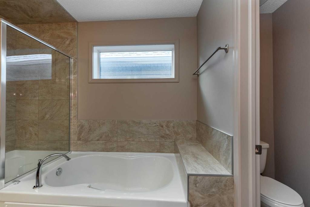 54 Cranford Bay Se, Calgary, AB - Indoor Photo Showing Bathroom