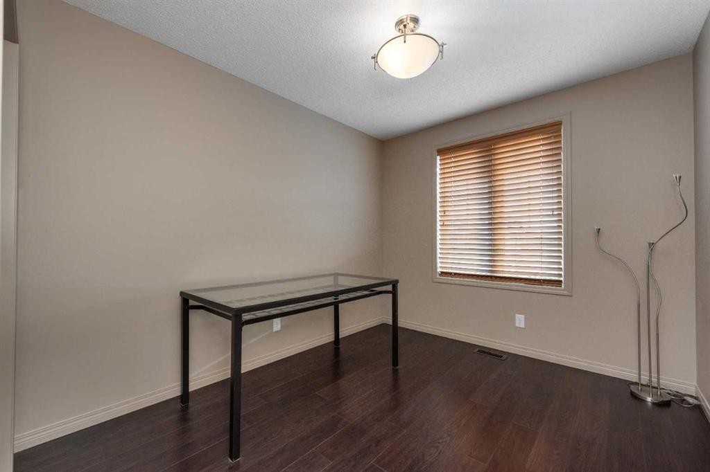 54 Cranford Bay Se, Calgary, AB - Indoor Photo Showing Other Room