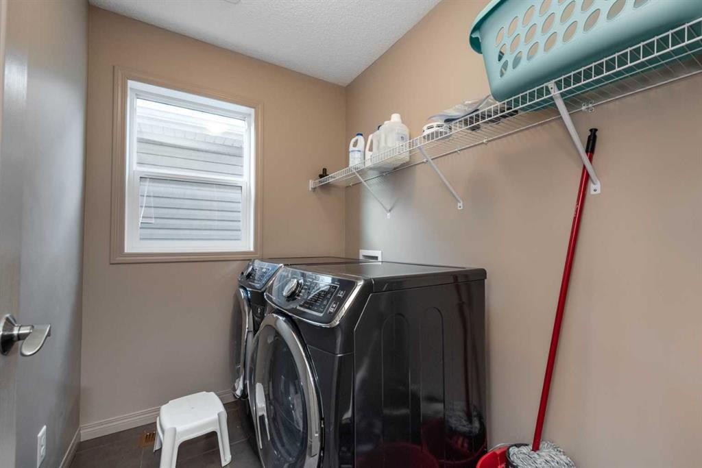 54 Cranford Bay Se, Calgary, AB - Indoor Photo Showing Laundry Room