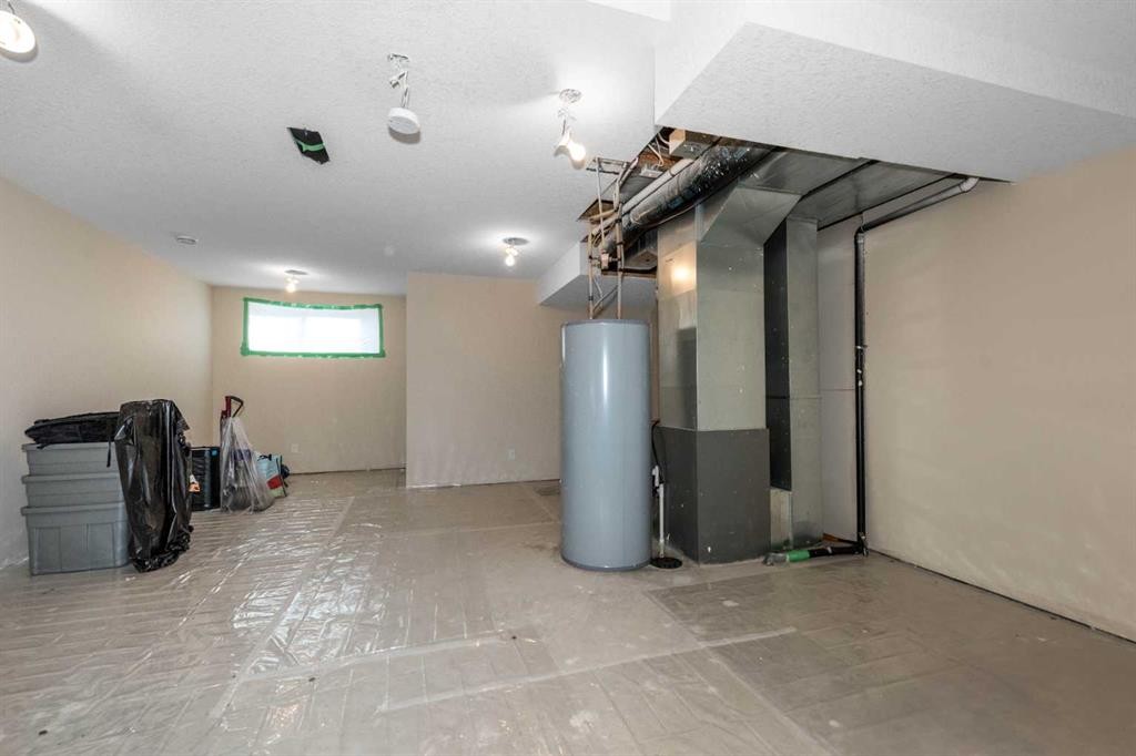 54 Cranford Bay Se, Calgary, AB - Indoor Photo Showing Basement