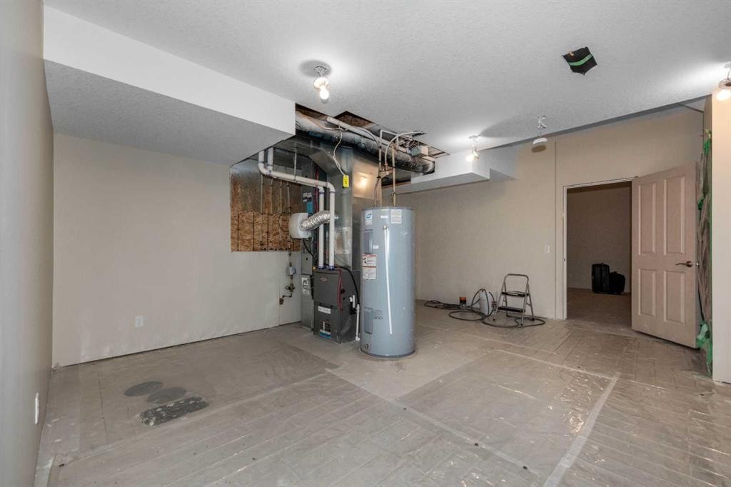 54 Cranford Bay Se, Calgary, AB - Indoor Photo Showing Garage