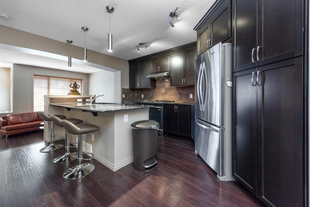 54 Cranford Bay Se, Calgary, AB - Indoor Photo Showing Kitchen With Upgraded Kitchen