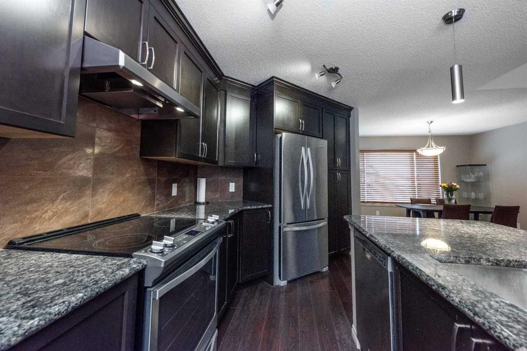54 Cranford Bay Se, Calgary, AB - Indoor Photo Showing Kitchen With Upgraded Kitchen