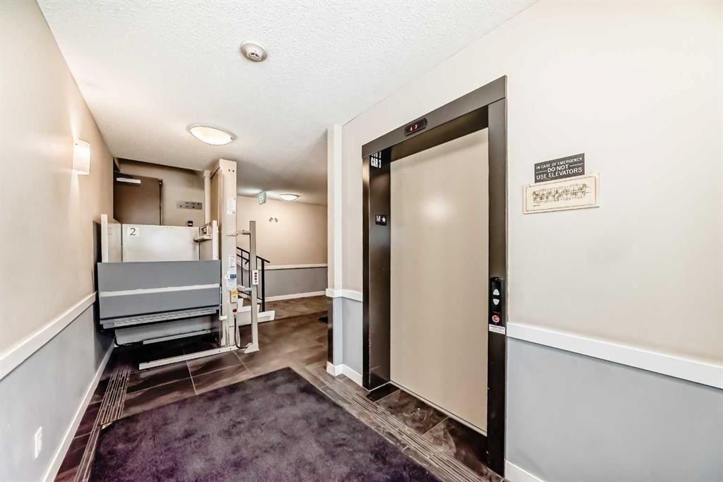 312-48 Panatella Road Nw, Calgary, AB - Indoor Photo Showing Other Room