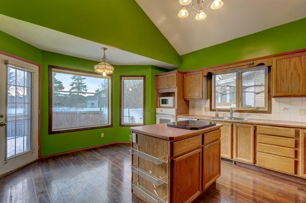 184 Riverbend Drive Se, Calgary, AB - Indoor Photo Showing Kitchen With Double Sink
