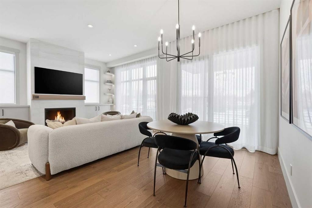 741 Serenity Bend, Heritage Pointe, AB - Indoor With Fireplace