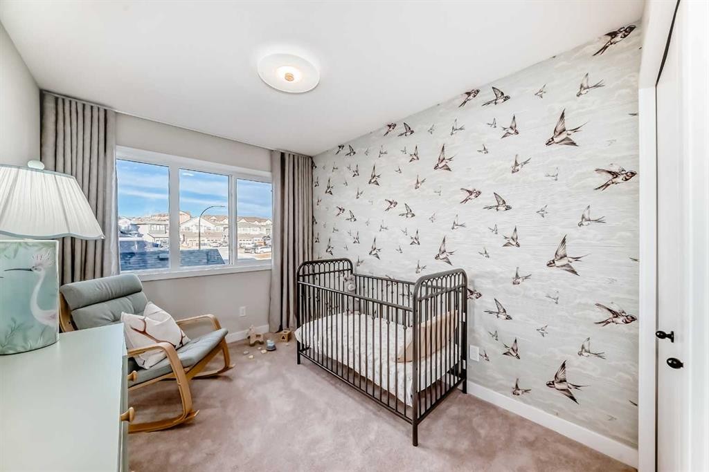 94 Agate Road, Cochrane, AB - Indoor Photo Showing Bedroom