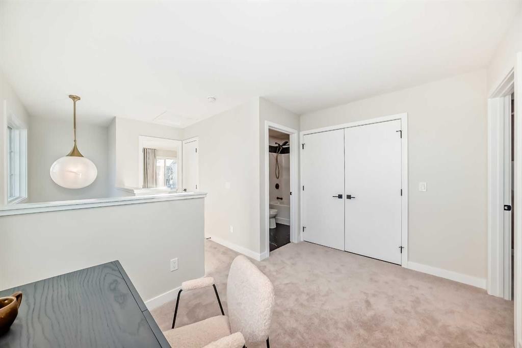 94 Agate Road, Cochrane, AB - Indoor Photo Showing Other Room