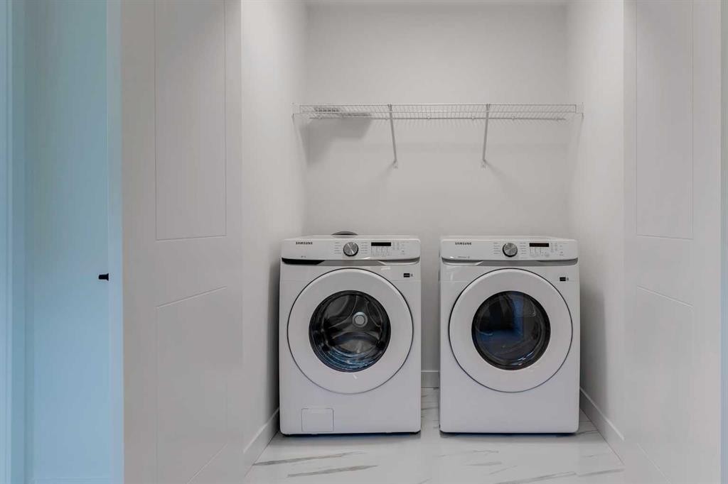 98 Agate Road, Cochrane, AB - Indoor Photo Showing Laundry Room