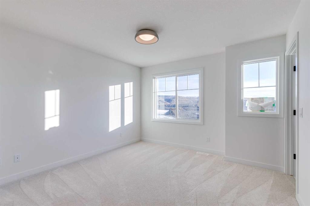 98 Agate Road, Cochrane, AB - Indoor Photo Showing Other Room