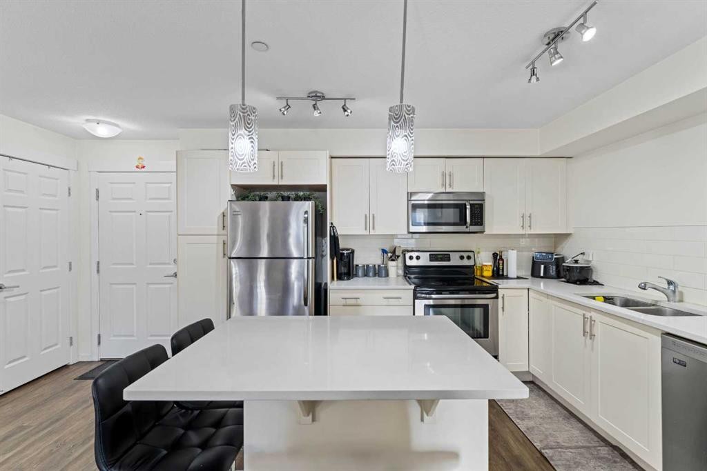 2313-99 Copperstone Park Se, Calgary, AB - Indoor Photo Showing Kitchen With Double Sink With Upgraded Kitchen