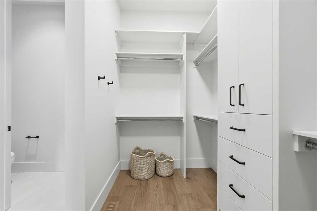 745 Serenity Bend, Heritage Pointe, AB - Indoor With Storage