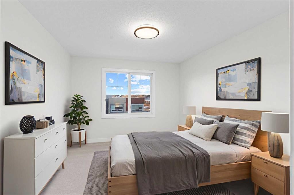 14 Ranchers Meadows, Okotoks, AB - Indoor Photo Showing Bedroom