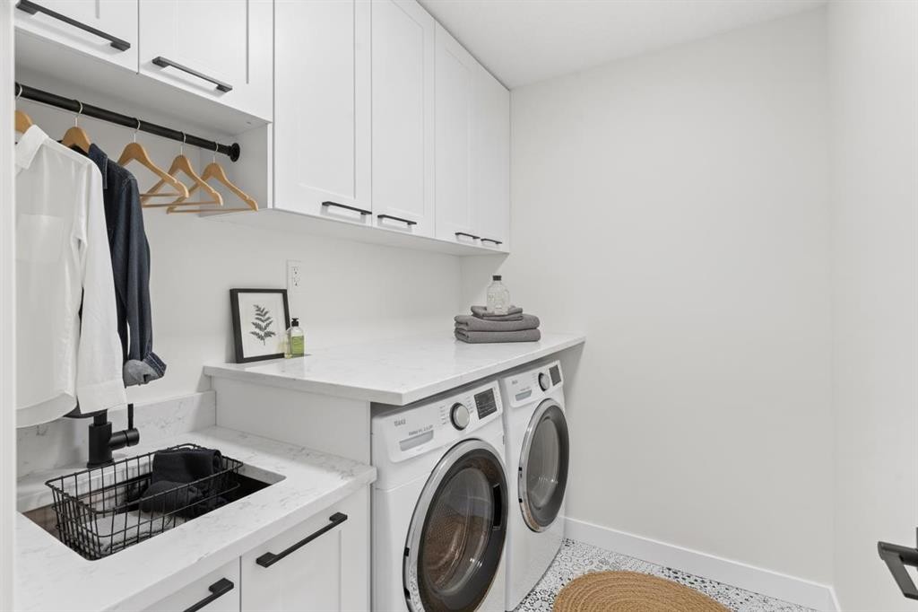 14 Ranchers Meadows, Okotoks, AB - Indoor Photo Showing Laundry Room