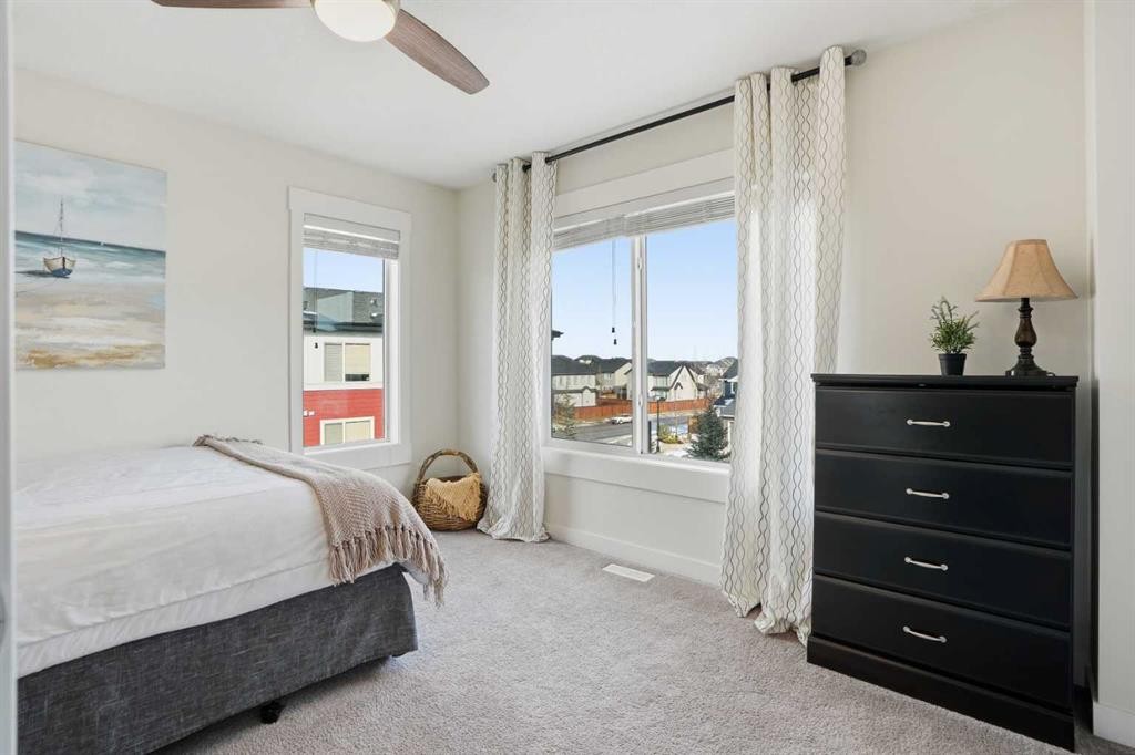 70-111 Rainbow Falls Gate, Chestermere, AB - Indoor Photo Showing Bedroom