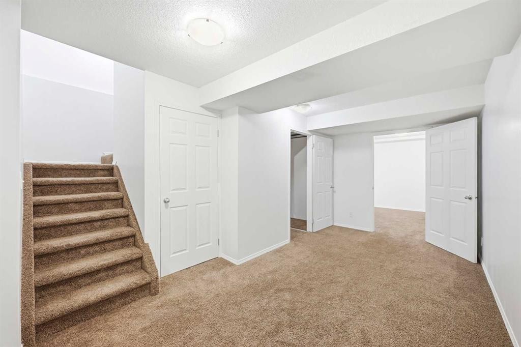 132 Royal Birch Mount Nw, Calgary, AB - Indoor Photo Showing Other Room