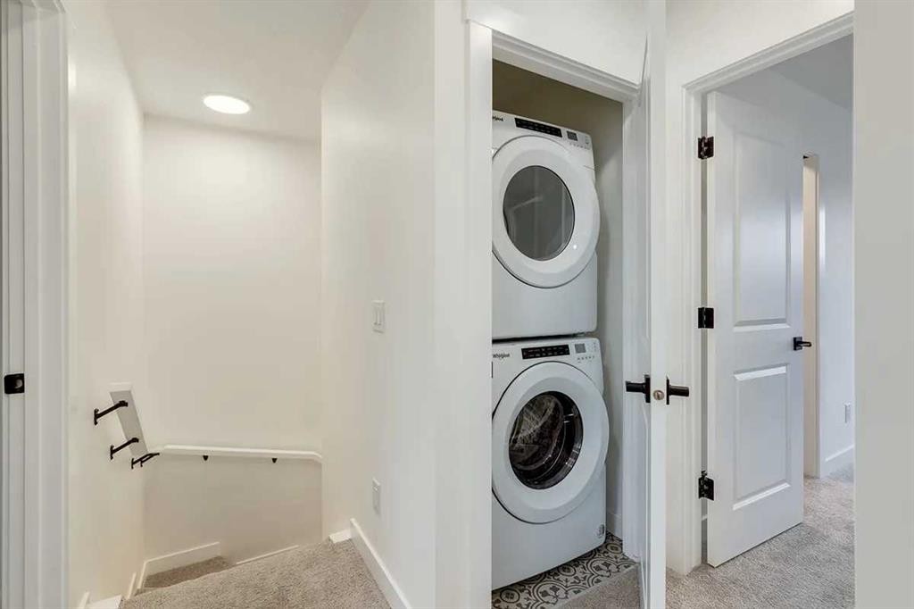 1507-525 River Heights Drive, Cochrane, AB - Indoor Photo Showing Laundry Room