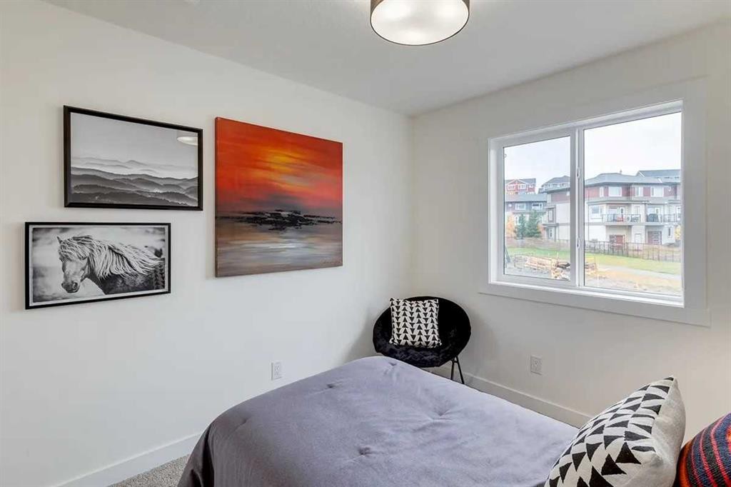 1507-525 River Heights Drive, Cochrane, AB - Indoor Photo Showing Bedroom