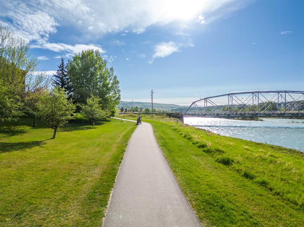 1507-525 River Heights Drive, Cochrane, AB - Outdoor With Body Of Water With View