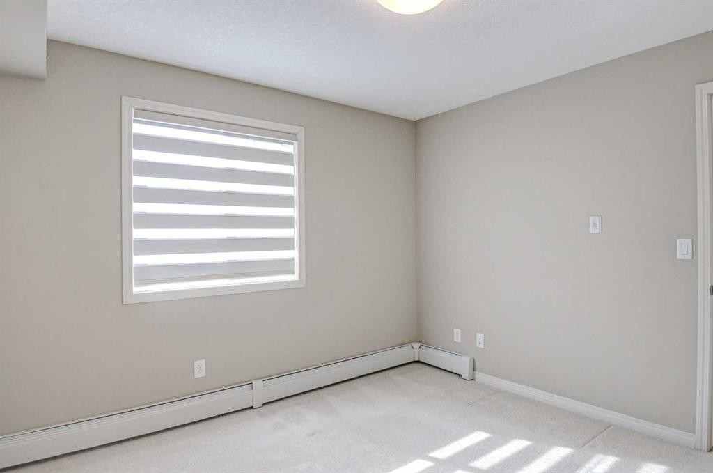 2217-130 Panatella Street Nw, Calgary, AB - Indoor Photo Showing Other Room