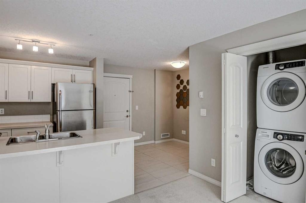 2217-130 Panatella Street Nw, Calgary, AB - Indoor Photo Showing Laundry Room