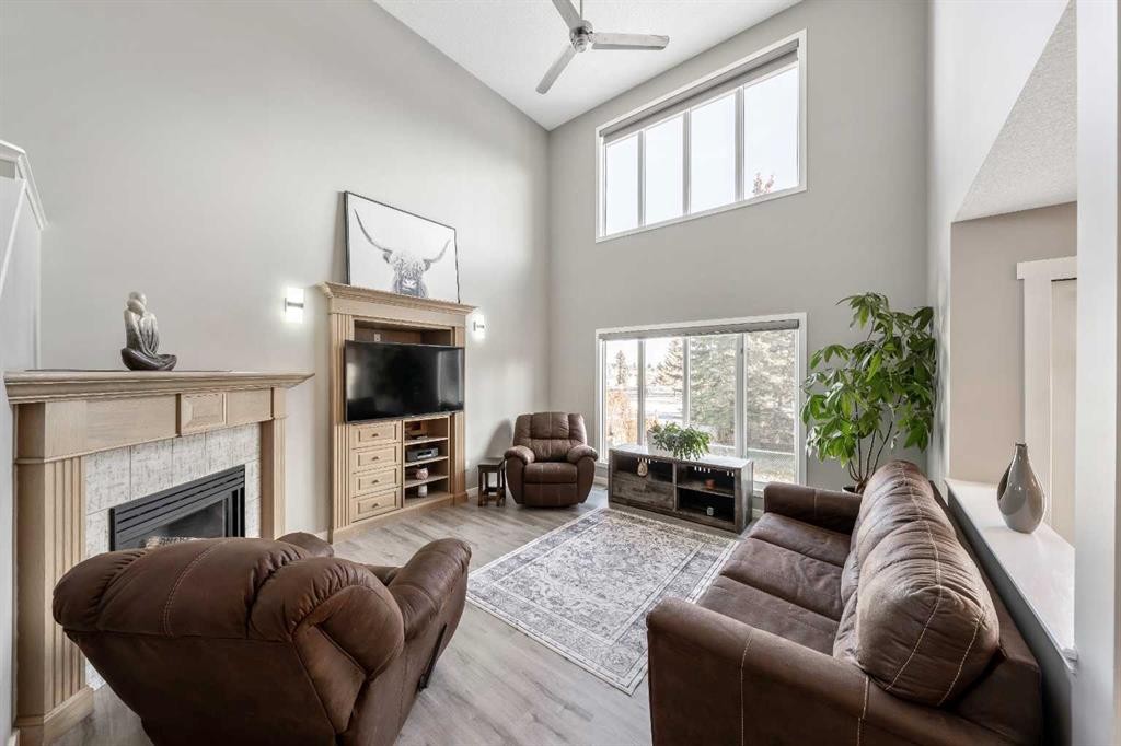 9 Hidden Valley Crescent Nw, Calgary, AB - Indoor Photo Showing Living Room With Fireplace