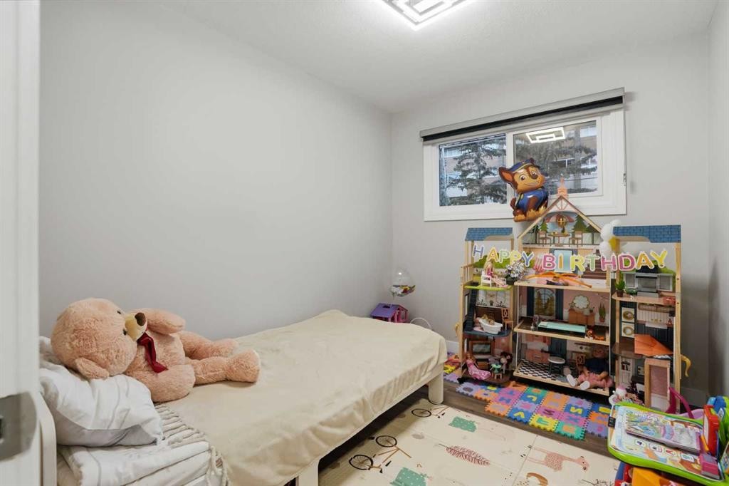 236 Fairview Drive Se, Calgary, AB - Indoor Photo Showing Bedroom
