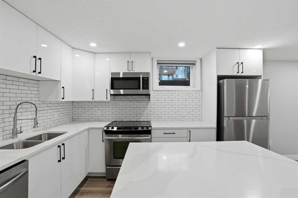 236 Fairview Drive Se, Calgary, AB - Indoor Photo Showing Kitchen With Stainless Steel Kitchen With Double Sink With Upgraded Kitchen