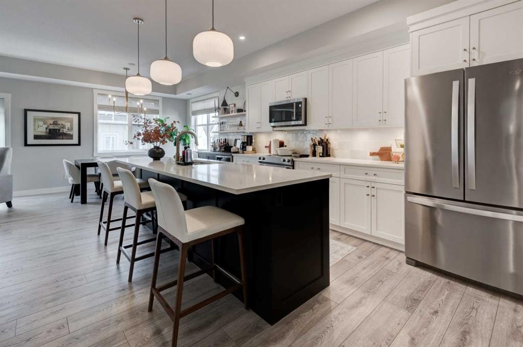 405 Cranbrook Walk Se, Calgary, AB - Indoor Photo Showing Kitchen With Upgraded Kitchen