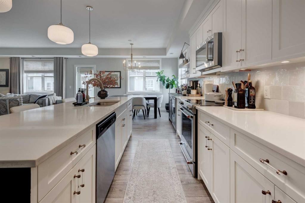 405 Cranbrook Walk Se, Calgary, AB - Indoor Photo Showing Kitchen With Upgraded Kitchen