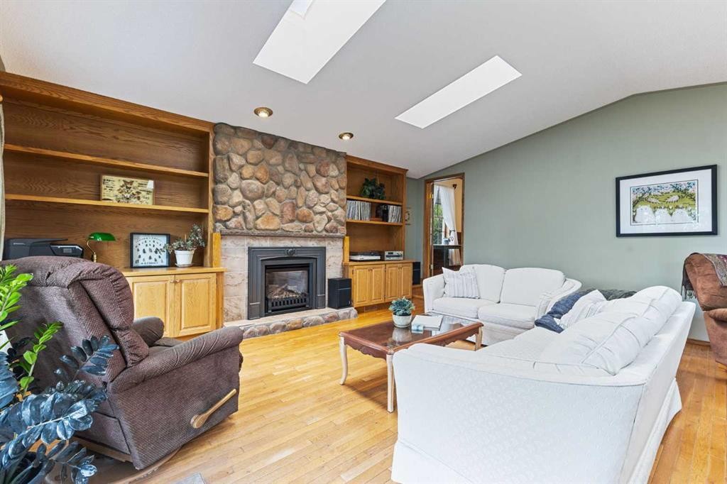 717 East Road, Standard, AB - Indoor Photo Showing Living Room With Fireplace