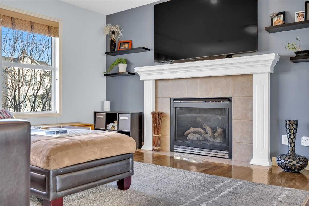 139 Prestwick Point Se, Calgary, AB - Indoor With Fireplace