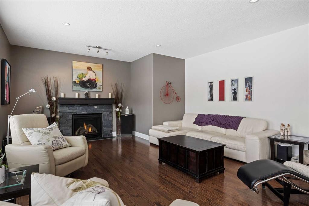 184 Magenta Crescent, Chestermere, AB - Indoor Photo Showing Living Room With Fireplace