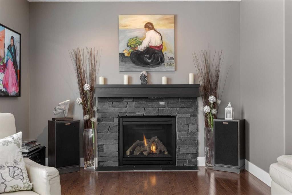184 Magenta Crescent, Chestermere, AB - Indoor Photo Showing Living Room With Fireplace