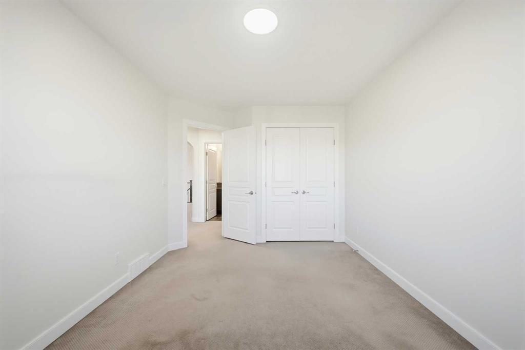 59 Redstone Park Ne, Calgary, AB - Indoor Photo Showing Other Room