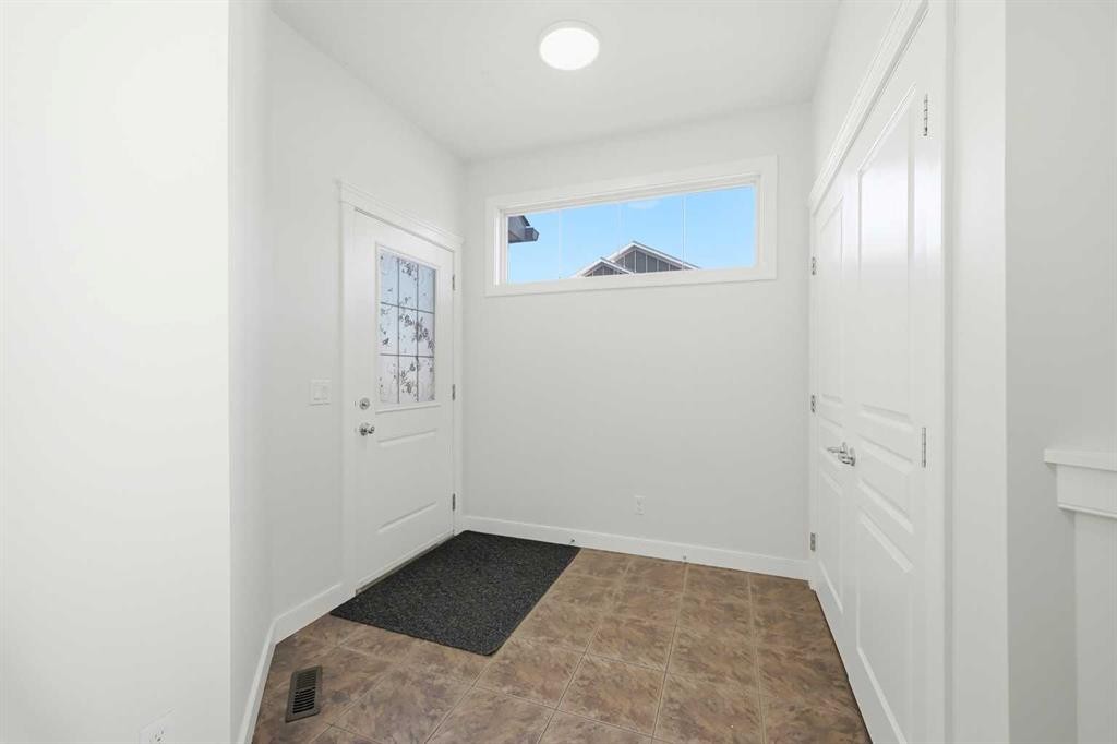 59 Redstone Park Ne, Calgary, AB - Indoor Photo Showing Other Room