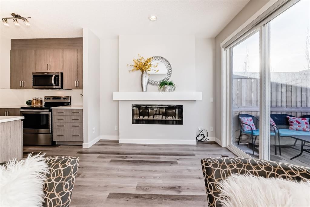 267 Sage Bluff Rise Nw, Calgary, AB - Indoor With Fireplace