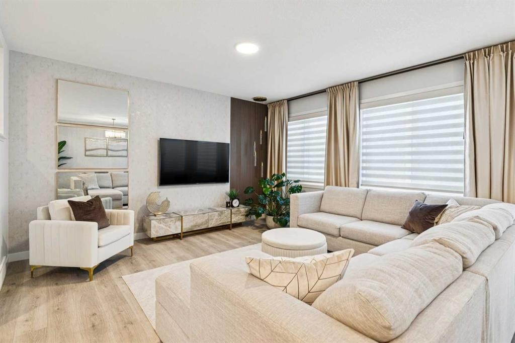 153 Edith Villas Nw, Calgary, AB - Indoor Photo Showing Living Room